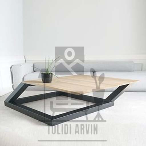 Table in front of wood metal sofa
